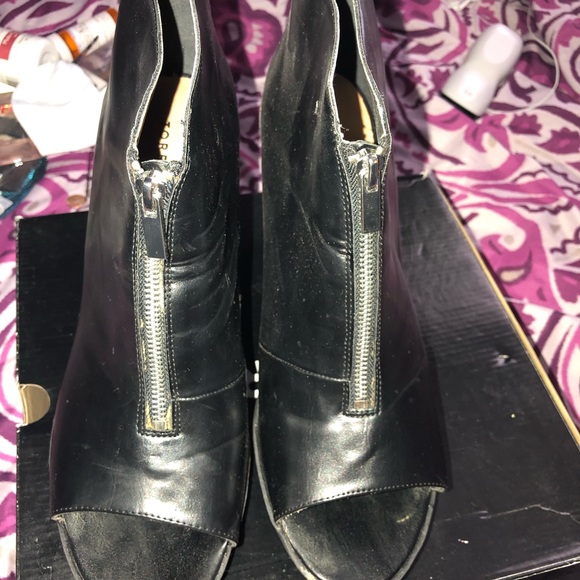 torrid Shoes - Black heeled ankle booties that zip up the front